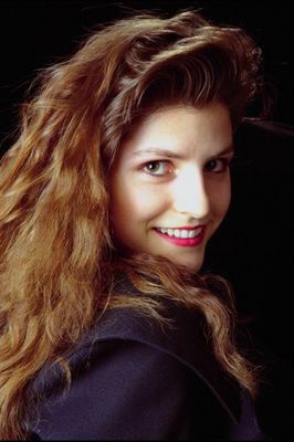 Woman smiling over shoulder.jpg
