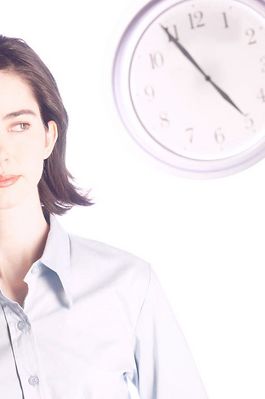 Woman standing in front of clock 1.jpg