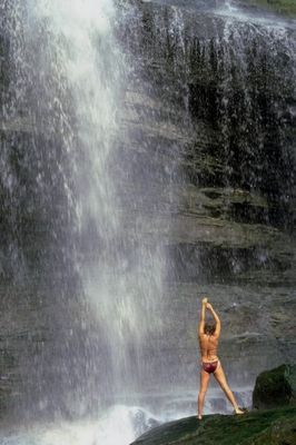 Woman standing in waterfall spray an 2.jpg