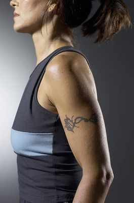 Woman tattooed arm uid 1283761.jpg