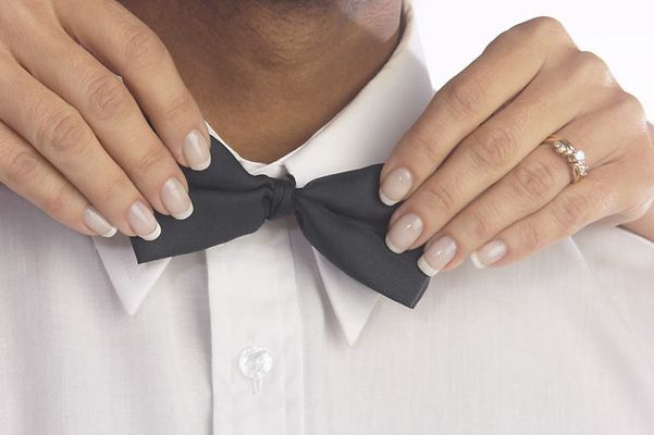 Woman tying tie 0004.jpg