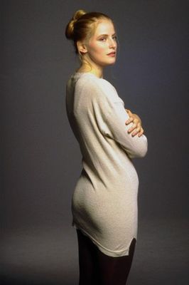 Woman wearing long white sweater.jpg