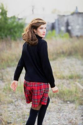 Woman wearing red plain skirt.jpg