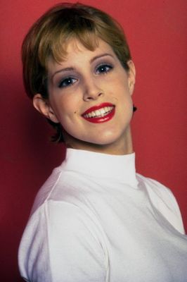Woman wearing white mock turtle neck.jpg