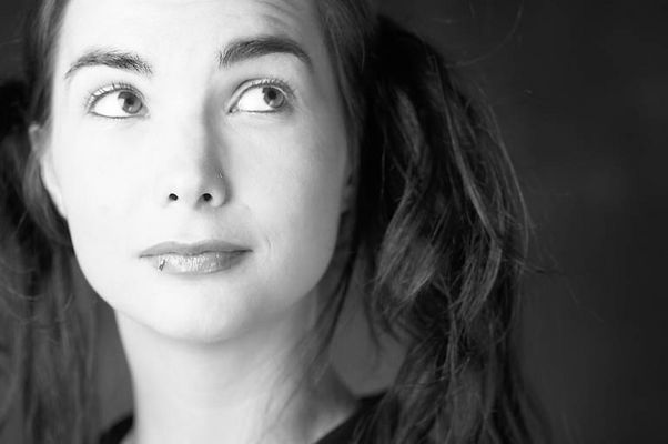 Woman with lip ring looking upwards.jpg