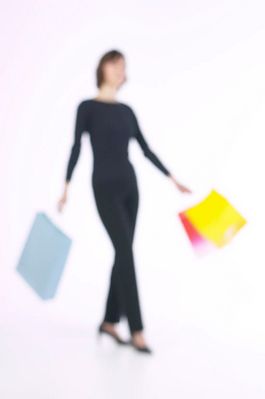 Woman with shopping bags uid 1343157.jpg
