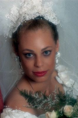 Woman with wedding veil and flowers.jpg
