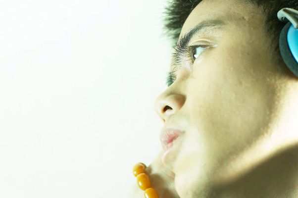 Youth listening to music on headphones 5.jpg