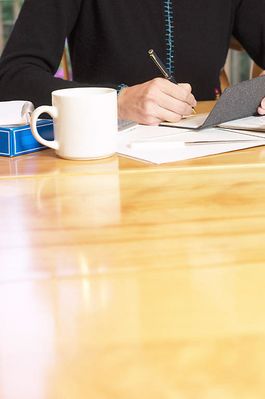 woman writing a check BE 2.jpg