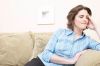 Angry woman sitting on couch.jpg