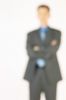 Blur of businessman with his crossed arms.jpg