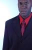Businessman in red shirt and tie 1.jpg