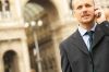 Businessman on cell phone uid 1433192.jpg