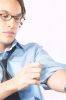 Businessman rolling up his sleeves.jpg