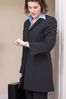 Businesswoman checking her watch.jpg