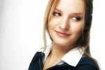 Close up of a young blond woman face with a white background uid 1453096.jpg