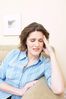 Distressed woman sitting on couch.jpg