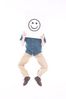 Man jumping while holding smiling face sign over his face.jpg