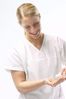 Masseuse pouring massage oil in her hands.jpg