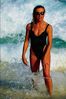 Model with black bathing suit and sunglasses.jpg