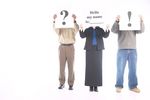 People holding up white sign.jpg