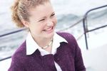 Smiling teenager on boat uid 1283653.jpg