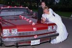 Wedding photo of couple with car.jpg