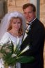 Wedding photo of couple with flowers.jpg