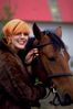 Woman holding horse.jpg