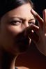 Woman holding nose in disgust uid 1426318.jpg