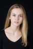 Woman in front of black background uid 1426777.jpg