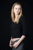 Woman in front of black background uid 1426786.jpg