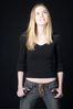 Woman in front of black background uid 1426794.jpg