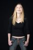 Woman in front of black background uid 1426795.jpg