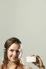 Woman in headset holding out card a82.jpg