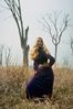 Woman in purple dress in field.jpg