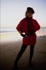 Woman in semi silhouette posing on beach.jpg