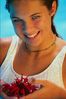 Woman in white bathing suit with flower.jpg