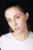 Woman in white t shirt uid 1426812.jpg