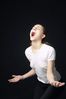 Woman in white t shirt uid 1426830.jpg