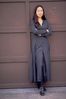 Woman leaning against garage door.jpg