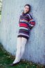 Woman leaning in striped sweater.jpg