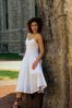Woman leaning on tree.jpg