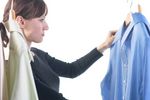 Woman looking at blue shirt.jpg