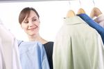 Woman picking out a shirt uid 1343149.jpg