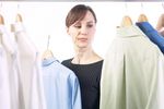 Woman picking out a shirt.jpg