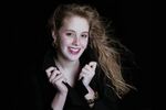 Woman posing in black jacket.jpg