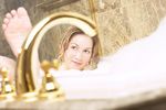 Woman relaxing in bubble bath 1.jpg