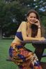 Woman sitting at picnic table.jpg