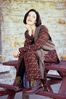Woman sitting on picnic table an 1.jpg